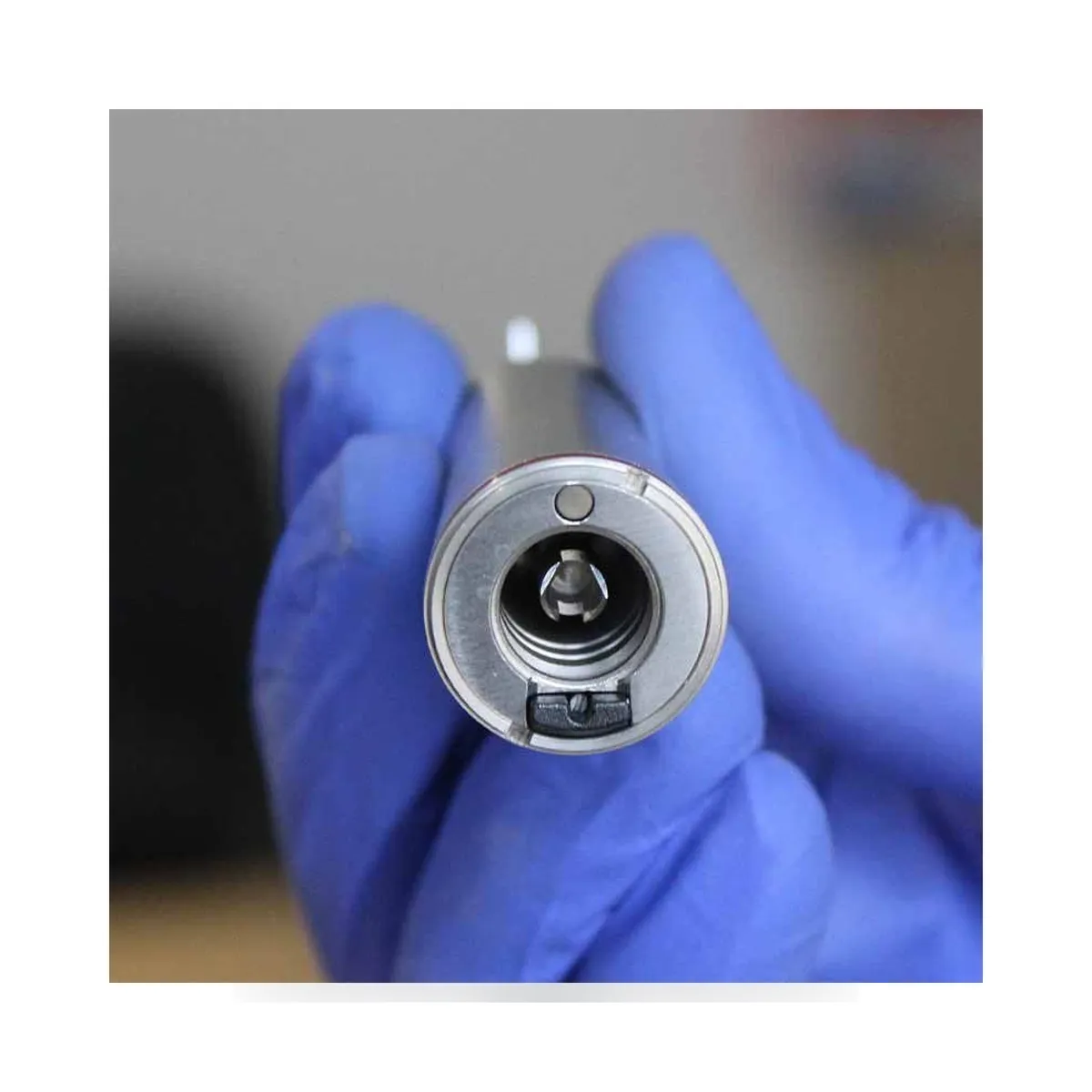Contre-angle multiplicateur 1:5 More Dent BR-422SS-15 en acier inoxydable avec bague rouge.